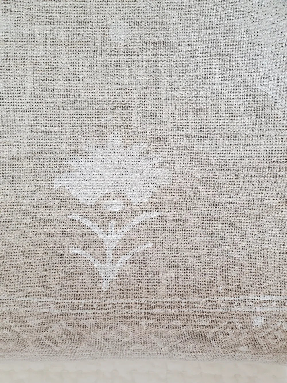 Elio Neutral Beige Linen Throw Pillow with White Floral Print 22x22